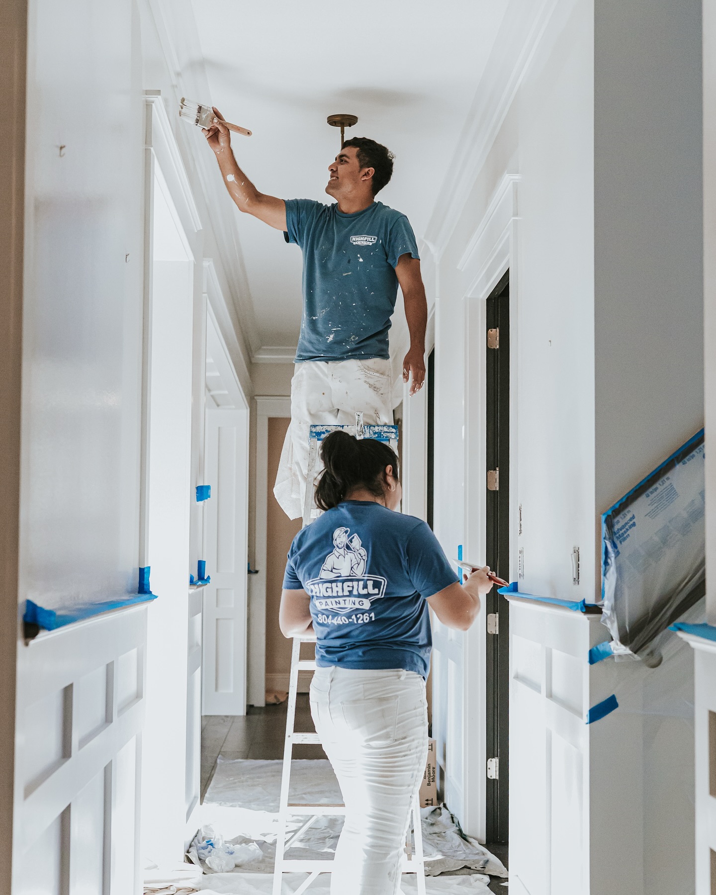 Highfill worker painting the inside of a home in Richmond, VA.